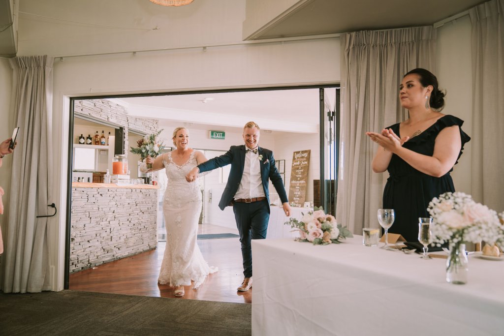 Real Bride Jamielle wearing her Custom Harriett Falvey Wedding Dress and Veil Made in New Zealand